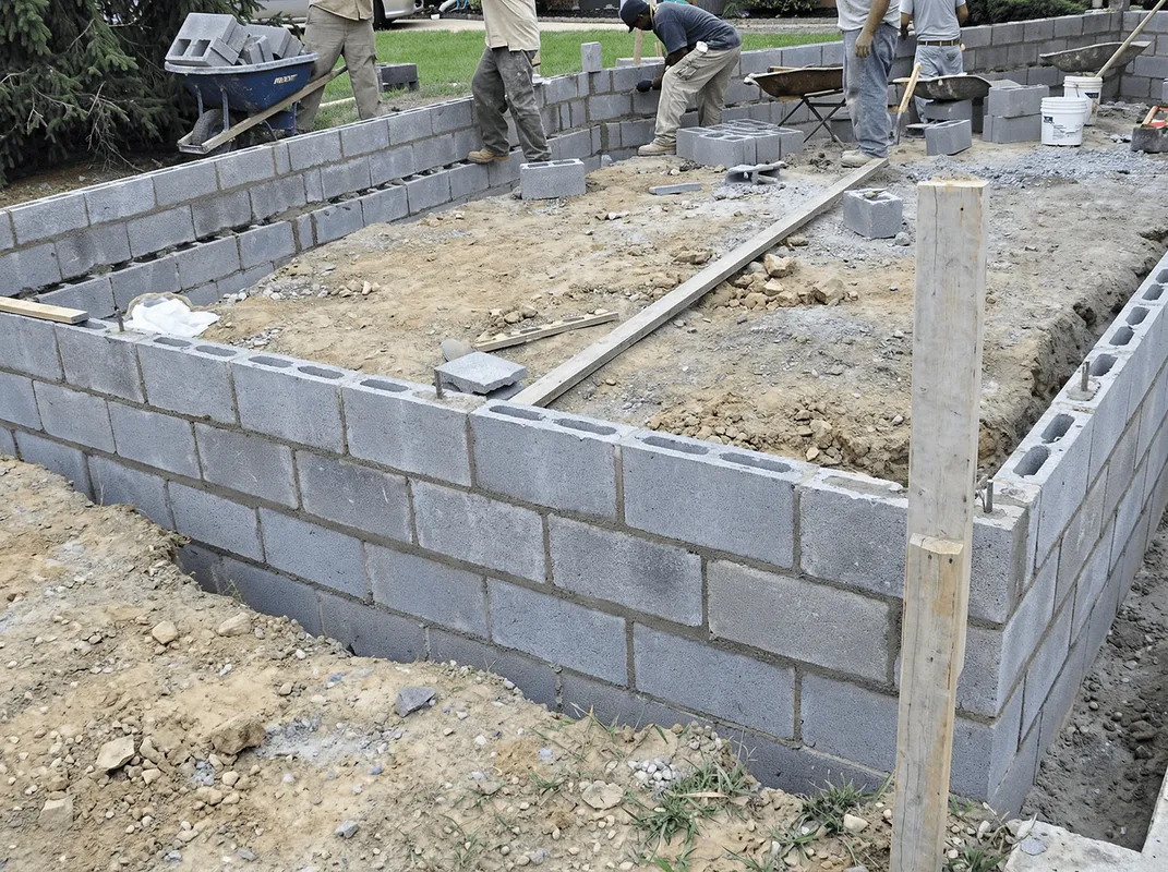 Professionals building a foundation with blocks in Milwaukee, WI