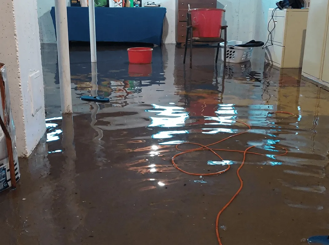 Basement with boiler, cabinets and washing machine completely flooded in Milwaukee, WI